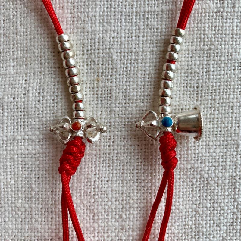 3mm Silver Mala Counters with bell and dorje and on red string