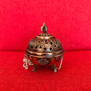 9.5cm Diameter Hanging Copper Incense Burner with oxidised finish and 8 Auspicious Symbols around the lid