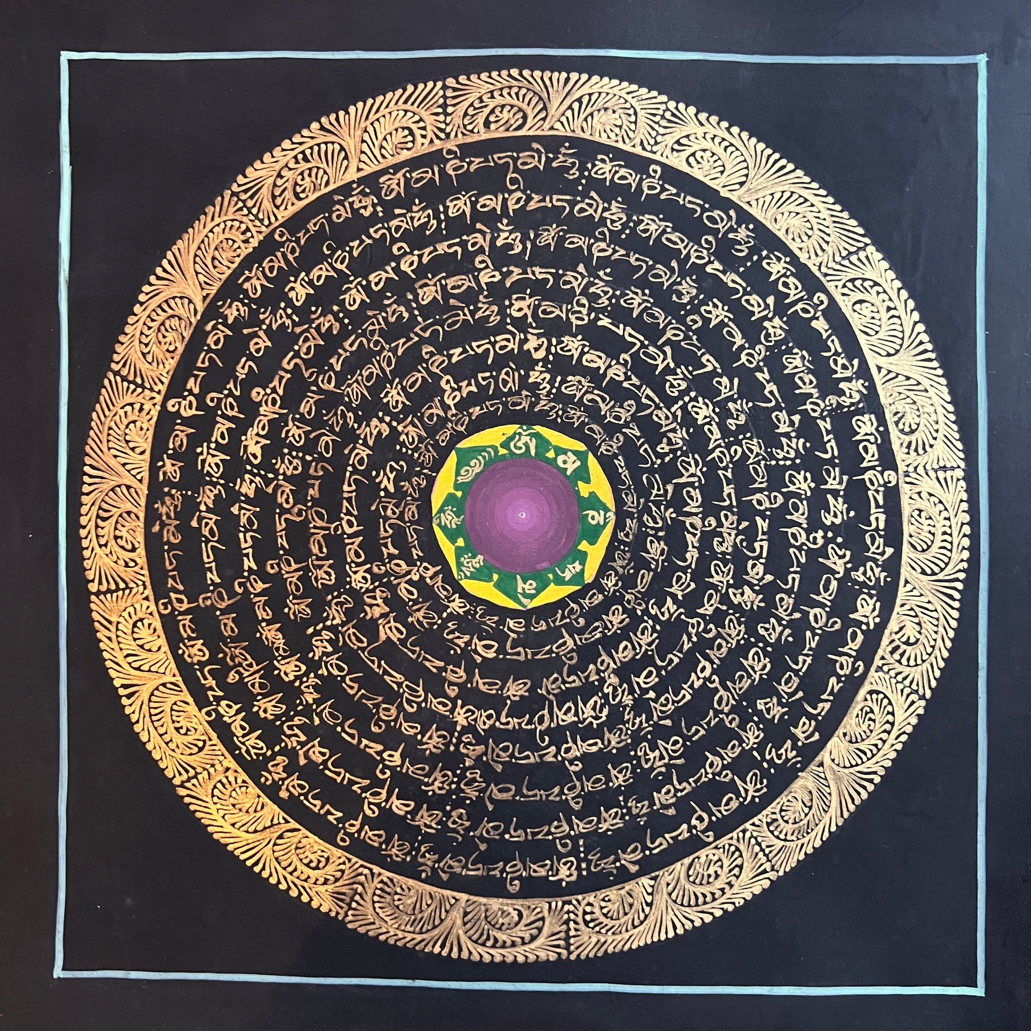 25cm Square MAndala Painting with the Tibetan Om Mani Padme Hung Mantra painted in gold and a purple centre on a black background