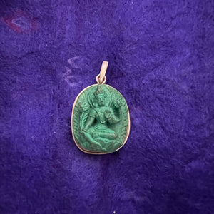 2.7cm sterling silver and resin pendant with a carving of Green Tara
