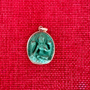 2.7cm sterling silver and resin pendant with a carving of Green Tara