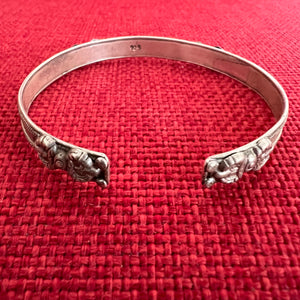 0.6cm wide flat shaped silver bangle with om mani padme hung mantra and dorje symbols