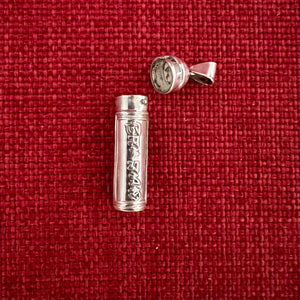 3.5cm vertical silver cylinder locket with Om Mani Padme Hung mantra embossed on each side