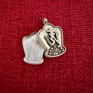 3.3cm silver locket in shrine box shape with Tibetan Om symbol embossed on the front 