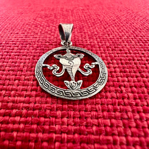 2cm silver pendant with Buddhist Auspicious Conch symbol