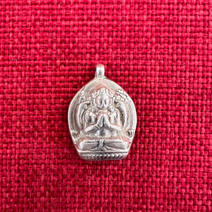 Silver pendant of Buddhist deity Chenrezig with 4 arms 