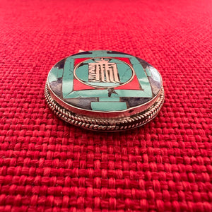 3cm round sterling silver and semi-precious coloured stone pendant with a silver inlay of the Kalachakra symbol 