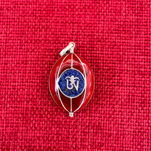 Red coloured silver pendant with Tibetan OM symbol on one side and the Endless Knot symbol on the other side