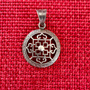 2cm silver pendant with Buddhist Mandala symbol