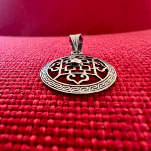 2cm silver pendant with Buddhist Mandala symbol