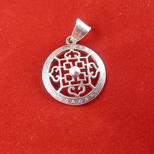 2cm silver pendant with Buddhist Mandala symbol