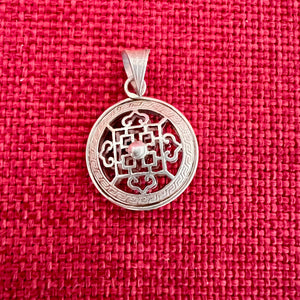 2cm silver pendant with Buddhist Mandala symbol on both sides and space between