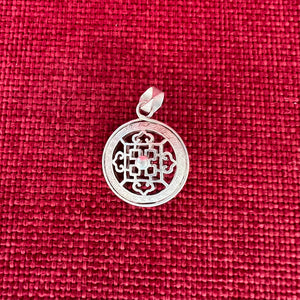 2cm silver pendant with Buddhist Mandala symbol on both sides and space between