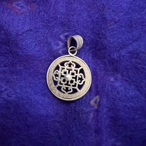 2cm silver pendant with Buddhist Mandala symbol on both sides and space between