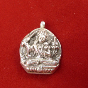 2.5cm high flat silver pendant with carved image of Manjushri