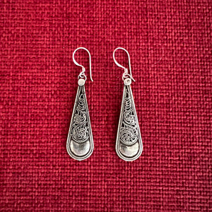 4cm Sterling silver filigree earrings in a long teardrop shape with plain silver at the bottom