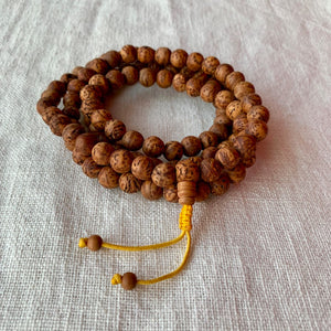 10mm Bodhi Seed Mala (Prayer Beads) with yellow string