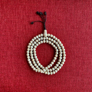 5mm Lotus Seed Mala with brown string and adjustable knot